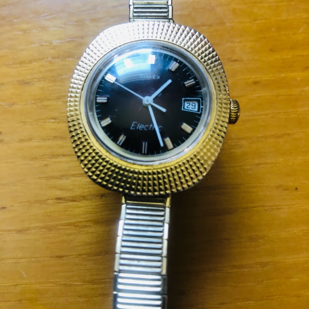 Timex Gold and Black Electric Watch